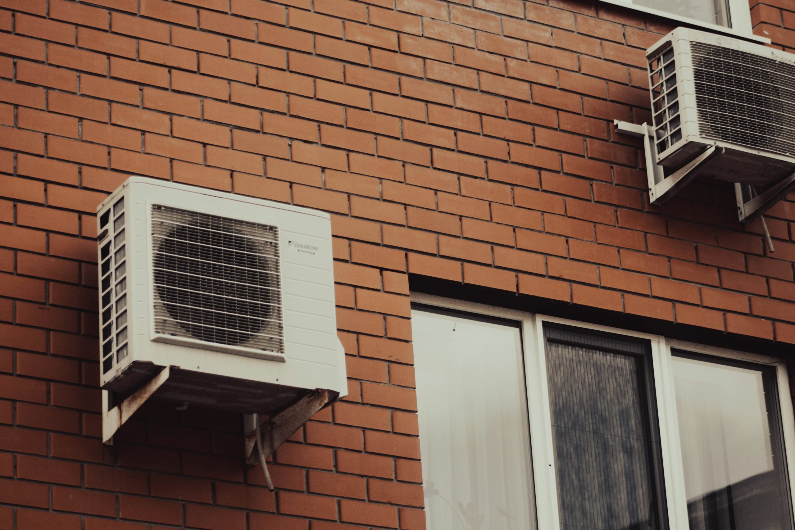 ac unit on brick wall